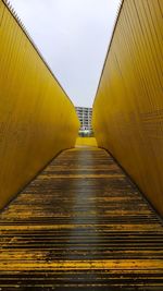 View of bridge against sky in city