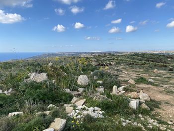Scenic view of land against sky