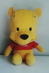 Close-up of stuffed toy over white background