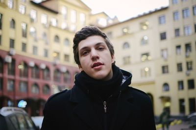 Portrait of man in city