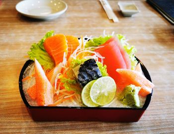 Close-up of fish served on table