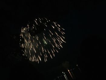 Low angle view of firework display