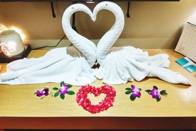 Close-up of heart shape on table