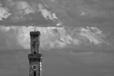 Low angle view of clock tower against sky