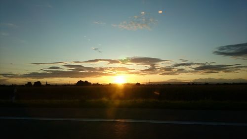 Scenic view of silhouette landscape against sky during sunset