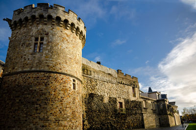 Low angle view of historic building against sky