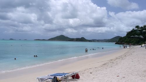 Panoramic view of beach against cloudy sky