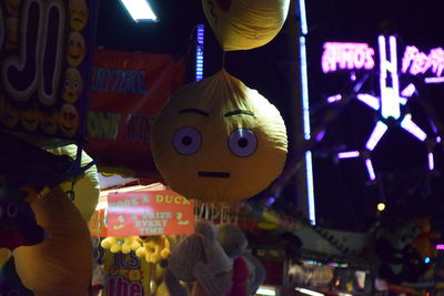 Close-up of illuminated lanterns hanging