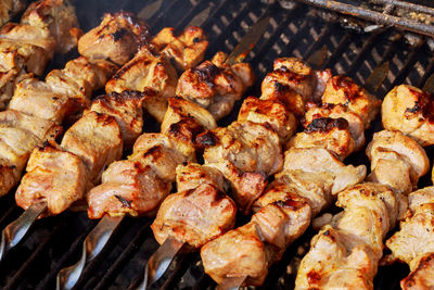 Close-up of meat on barbecue grill