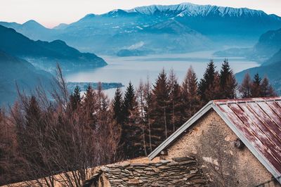 High angle view of houses and mountains during winter