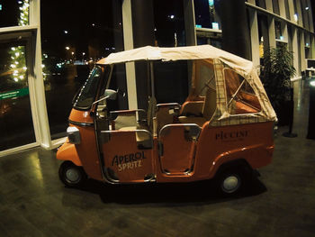 Vintage car on street at night