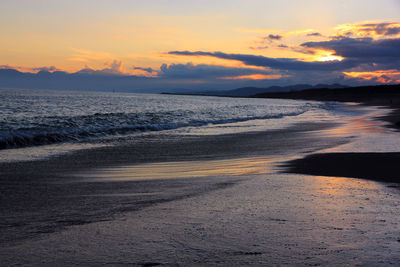 Scenic view of sea against sky during sunset