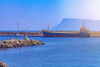 An old ship near the sea pier moored for dismantling