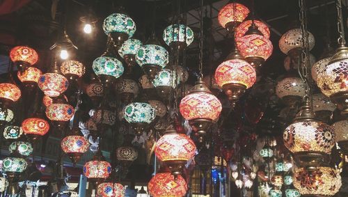 Low angle view of multi colored lanterns for sale