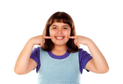 Portrait of a smiling girl over white background