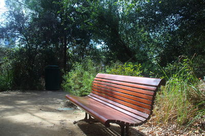 Empty bench in park