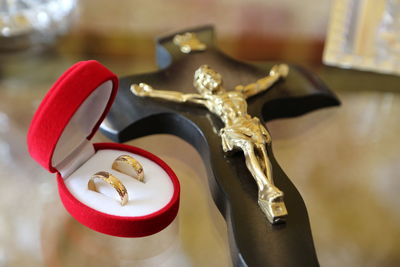 Close-up of antique and eyeglasses on metal