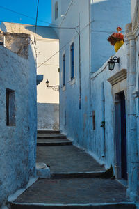 Greek village typical view with whitewashed houses and stairs. plaka town, milos island, greece