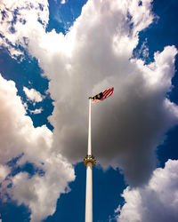 Low angle view of malaysian flag against sky