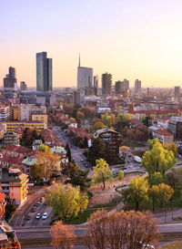 High angle view of buildings in city against clear sky