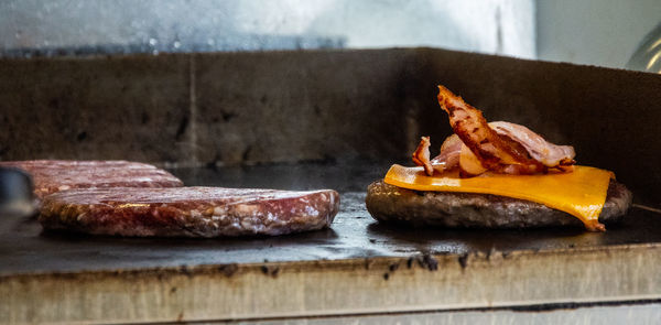 Close-up of meat on barbecue grill