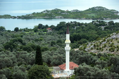 High angle view of religious building surrounded by trees