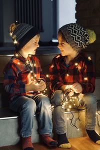 Two boys celebrating christmas