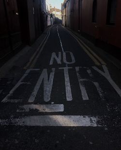 Road sign on street in city