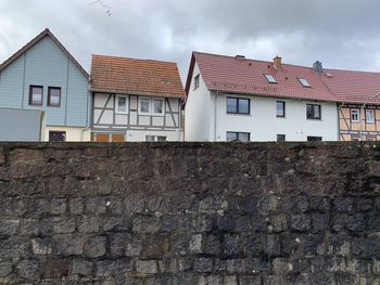  view of wall and buildings in rural village of thuringia, germany