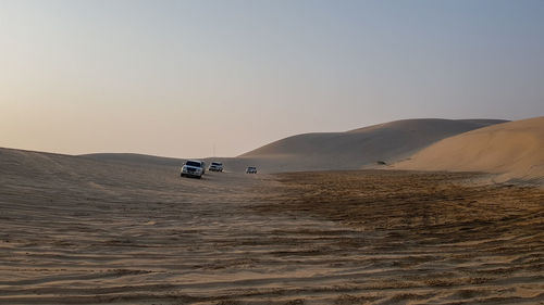 Scenic view of desert against clear sky