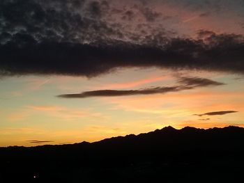 Scenic view of mountains at sunset