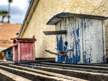 Close-up of old wooden door of building