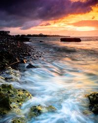 Scenic view of sea against sky during sunset