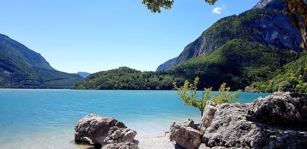 Panoramic view of sea and rocks against sky