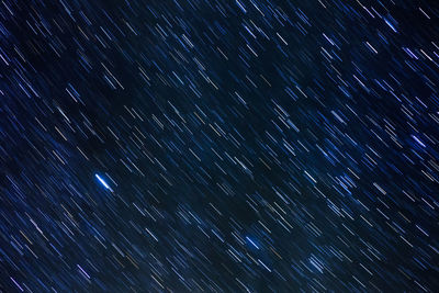 Low angle view of star field against sky at night