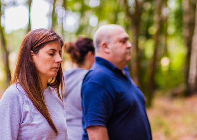 People standing in forest