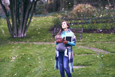 Portrait of woman on field