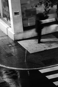 High angle view of person walking on street