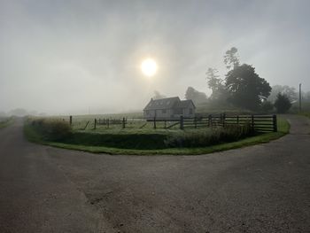 Scenic view of landscape against sky during sunrise