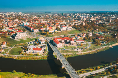 High angle view of houses and buildings in city