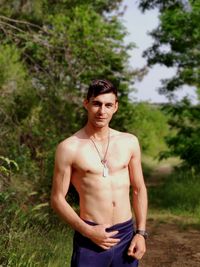 Portrait of young man standing outdoors