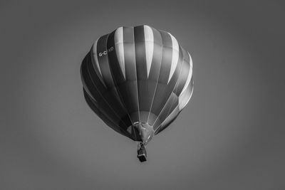 Low angle view of hot air balloon against clear sky