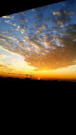 Scenic view of silhouette landscape against sky during sunset