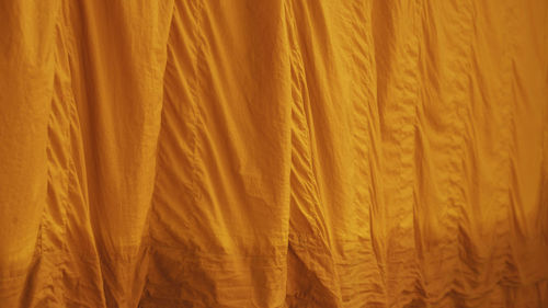 Full frame shot of yellow curtain