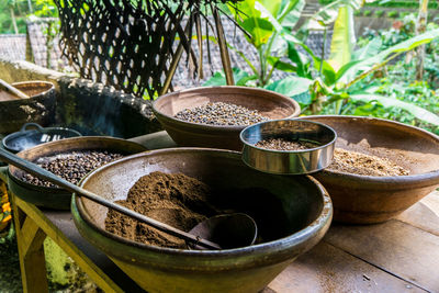 Spices in containers on table