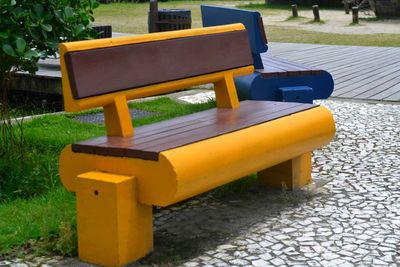 Empty bench in park