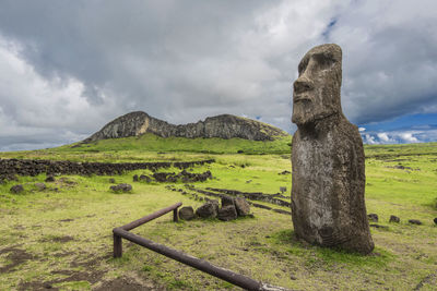 Moai sculpture at easter island against sky