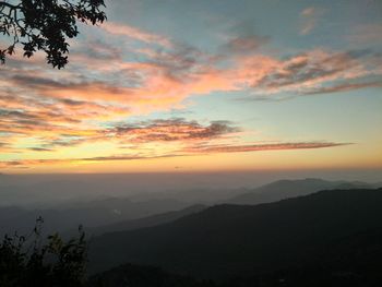 Scenic view of silhouette landscape against sky during sunset