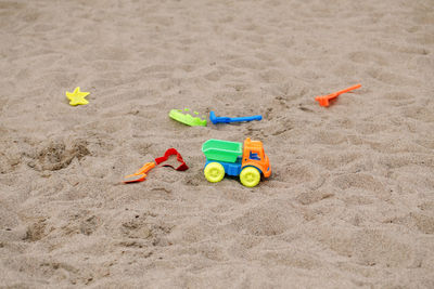 High angle view of toys at beach