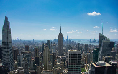 Modern buildings in city against sky